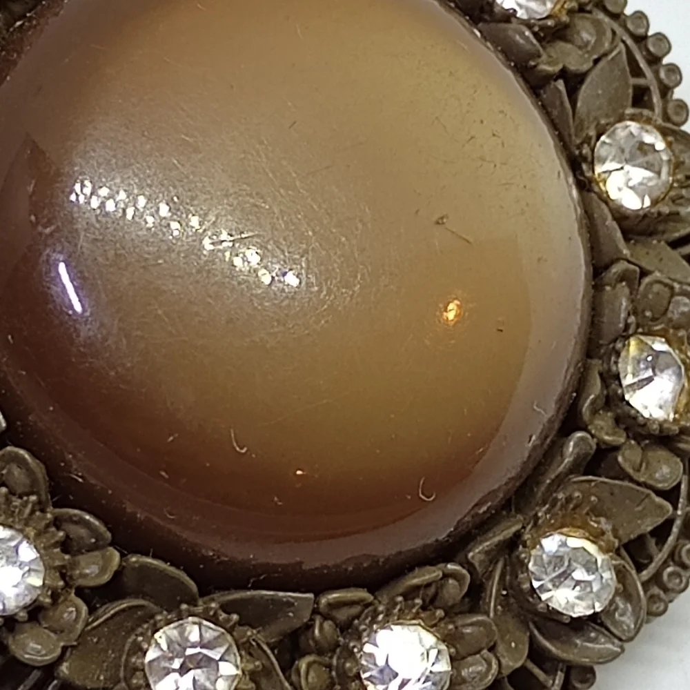 * vintage brown celluloid & moonglow clip on earrings